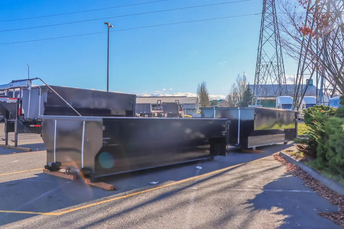 Roll-off dumpster ready for waste disposal at job site for 12 Yard Dumpster Rental in Peachtree City